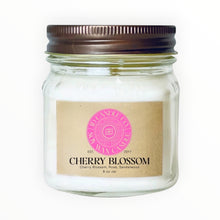 Load image into Gallery viewer, JD Candle Co. Japanese Cherry Blossom 8 oz soy wax candle in a clear mason jar with a bronze lid. Scent notes: ozone, cherry blossom, magnolia, rose, cherry, sandalwood.