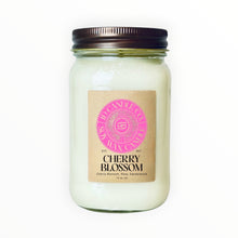 Load image into Gallery viewer, JD Candle Co. Japanese Cherry Blossom 16 oz soy wax candle in a mason jar with a bronze lid. Scent notes: cherry blossom, rose, sandalwood.