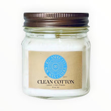Load image into Gallery viewer, D Candle Co. Black Sea scented candle in an 8 oz glass jar with a rustic brown lid. Features a kraft paper label with blue, black and kraft branding.