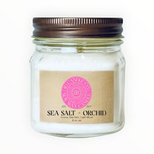 Load image into Gallery viewer, JD Candle Co. Sea Salt + Orchid 8 oz jar candle with a bronze lid. Scent notes: Ozone, Sea Salt, Light Musk.