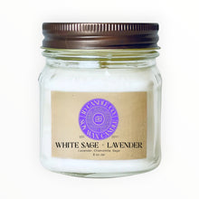 Load image into Gallery viewer, JD Candle Co. white sage and lavender scented soy wax candle in an 8 oz glass mason jar with a rustic brown lid.