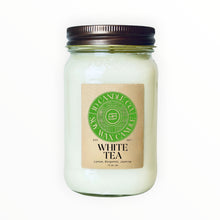 Load image into Gallery viewer, JD Candle Co. white tea scented candle in a 16 oz mason jar with a brown lid. Notes of lemon, bergamot, and jasmine.